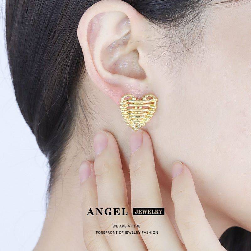 2023 New French Weaving Texture Sense Of Love Earrings Premium Sense Of Earrings Female Niche Premium Sense Of Earrings Wholesale